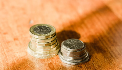 Piles of coins, representing financial savings